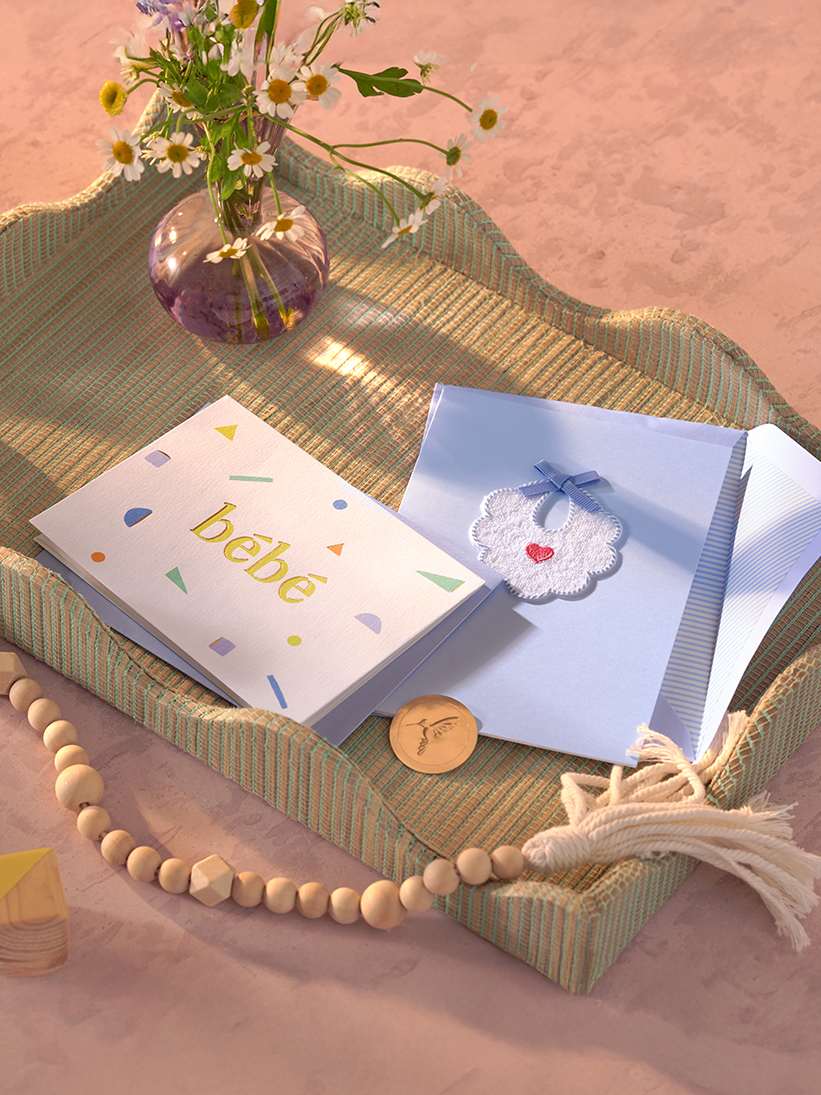 Baby greeting cards on a tray