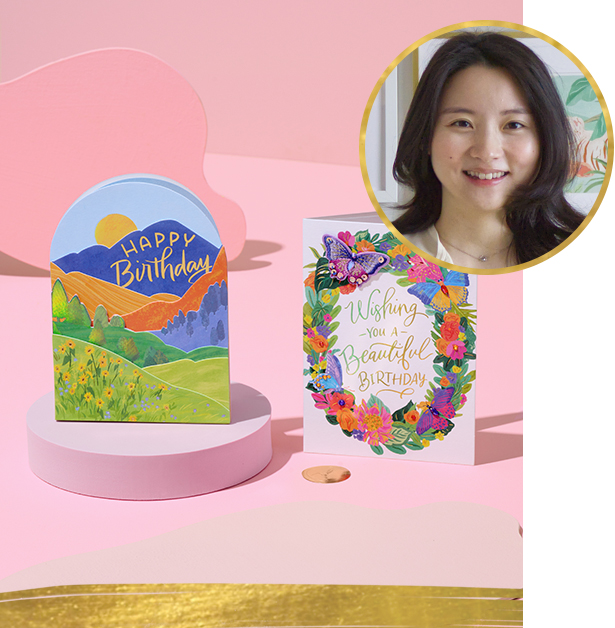 Sun Lee Artist photo with two cards she designed
